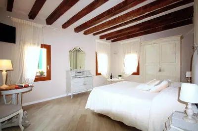 Letto o letti in una camera di Terrazza Biennale