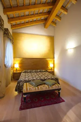 Letto o letti in una camera di Hotel Asolo