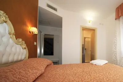 Letto o letti in una camera di B&B Rialto Dream