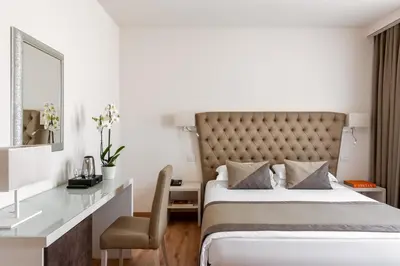 Letto o letti in una camera di UNAHOTELS Eco Hotel Villa Costanza Venezia