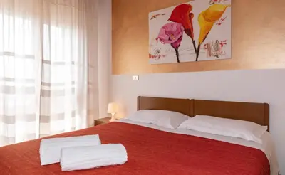 Letto o letti in una camera di Hotel Nazionale
