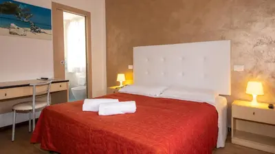 Letto o letti in una camera di Hotel Nazionale