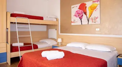 Letto o letti in una camera di Hotel Nazionale