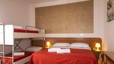 Letto o letti in una camera di Hotel Nazionale