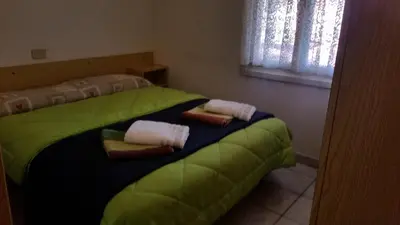 Letto o letti in una camera di Eureka Azienda Agrituristica