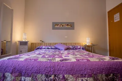 Letto o letti in una camera di Albergo Felice