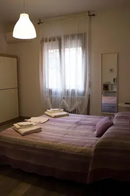 Letto o letti in una camera di Albergo Felice