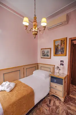 Letto o letti in una camera di Hotel Al Piave