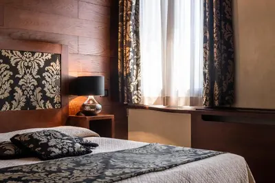 Letto o letti in una camera di Abbazia De Luxe