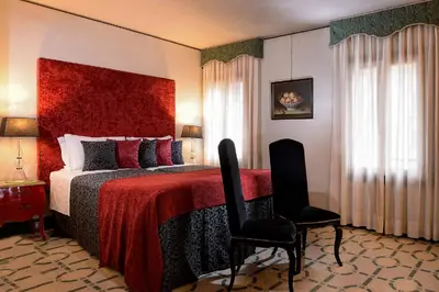 Letto o letti in una camera di Palazzo del Giglio