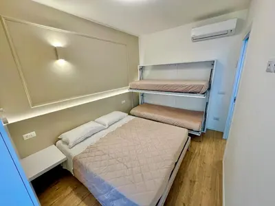 Letto o letti in una camera di Appartamenti Luigi e Carla