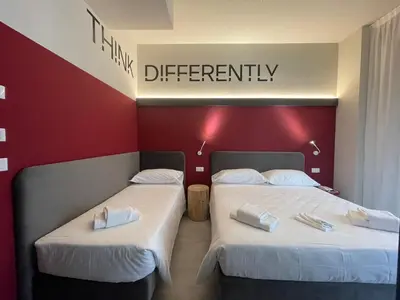 Letto o letti in una camera di Hotel Iris Jesolo