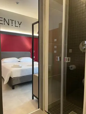 Letto o letti in una camera di Hotel Iris Jesolo