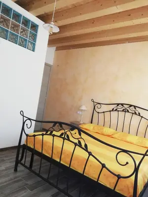 Letto o letti in una camera di La casa nel bosco