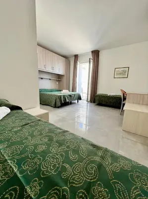 Letto o letti in una camera di Hotel Terramare