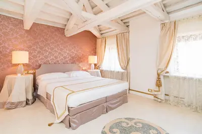 Letto o letti in una camera di WellVenice Fenice