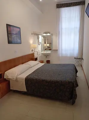 Letto o letti in una camera di Hotel Caneva