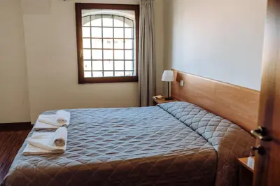 Letto o letti in una camera di Hotel Casa a Colori Venezia