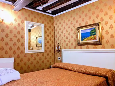 Letto o letti in una camera di Ca' San Vio