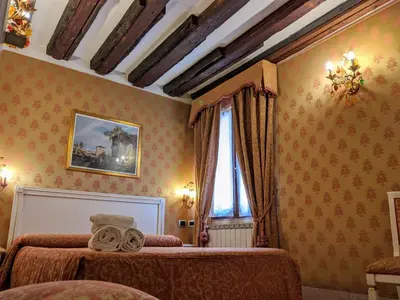 Letto o letti in una camera di Ca' San Vio