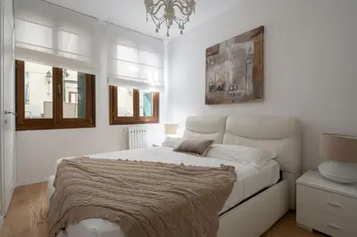 Letto o letti in una camera di San Marco Prestige with Terrace by Wonderful Italy