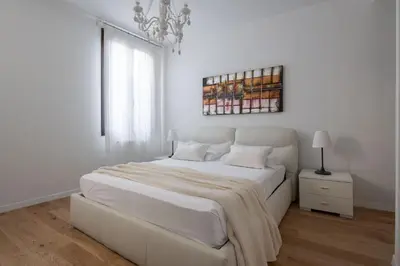 Letto o letti in una camera di San Marco Prestige with Terrace by Wonderful Italy