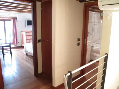 Letto o letti in una camera di Casa Carlo Goldoni