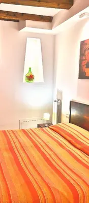 Letto o letti in una camera di Sansamuele Apartment