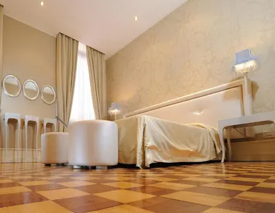 Letto o letti in una camera di Hotel Ai Due Principi