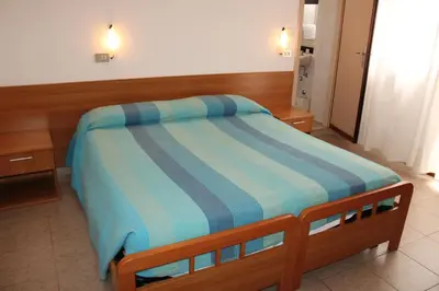 Letto o letti in una camera di Hotel Caravel