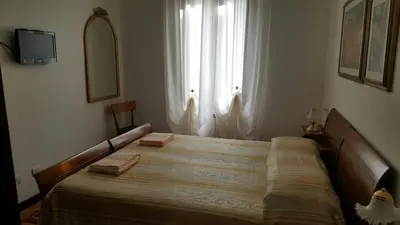 Letto o letti in una camera di Chiara Apartment
