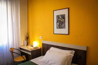 Letto o letti in una camera di Hotel Centrale