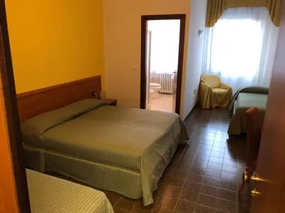 Letto o letti in una camera di Hotel Centrale