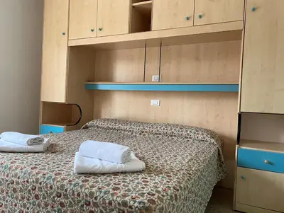 Letto o letti in una camera di Hotel Mirage