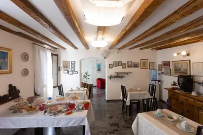 Area soggiorno di B&B Antico Orologio