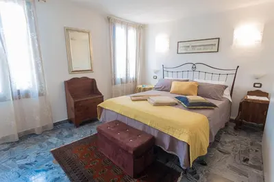 Letto o letti in una camera di B&B Antico Orologio