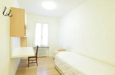 Letto o letti in una camera di Al Campanile