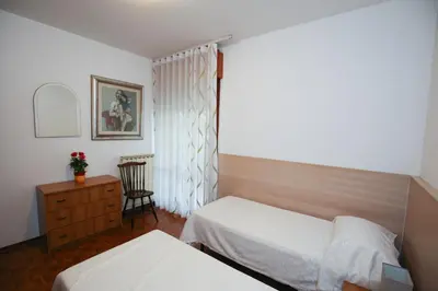 Letto o letti in una camera di Appartamento Martina C.