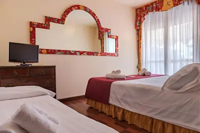 Letto o letti in una camera di Agora Park Hotel