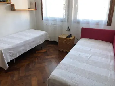 Letto o letti in una camera di Casa Vacanze Lido Di Venezia