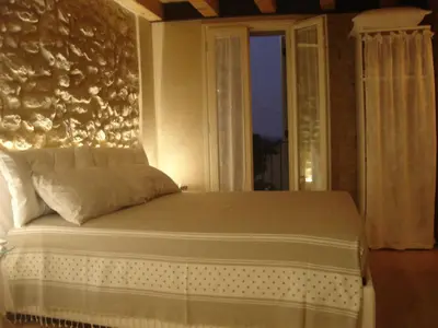 Letto o letti in una camera di Casa Daisy