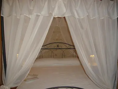 Letto o letti in una camera di Casa Daisy