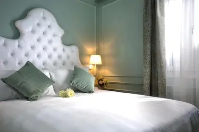 Letto o letti in una camera di Aquamare, boutique b&b