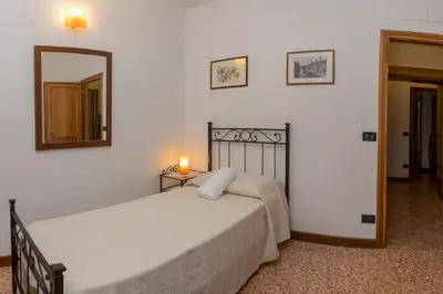 Letto o letti in una camera di Casa San Giovanni e Paolo