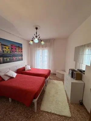 Letto o letti in una camera di Ca' Ermagora