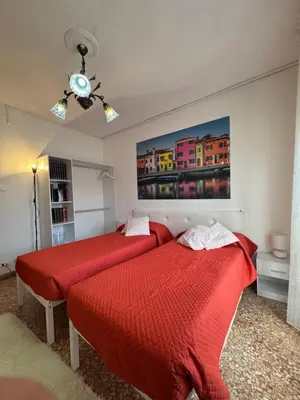 Letto o letti in una camera di Ca' Ermagora