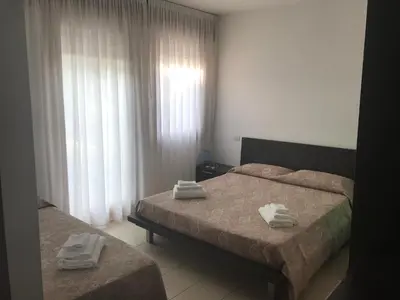 Letto o letti in una camera di Villa Gentile