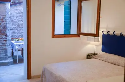 Letto o letti in una camera di Cà Marin