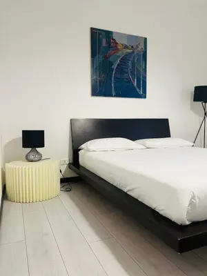 Letto o letti in una camera di Appartamento al Duomo