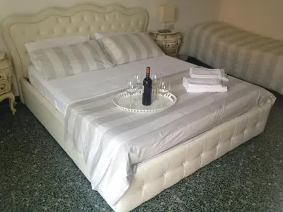 Letto o letti in una camera di Casa Renier-Biennale